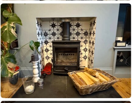 Period tiled fireplace with cast-iron stove
